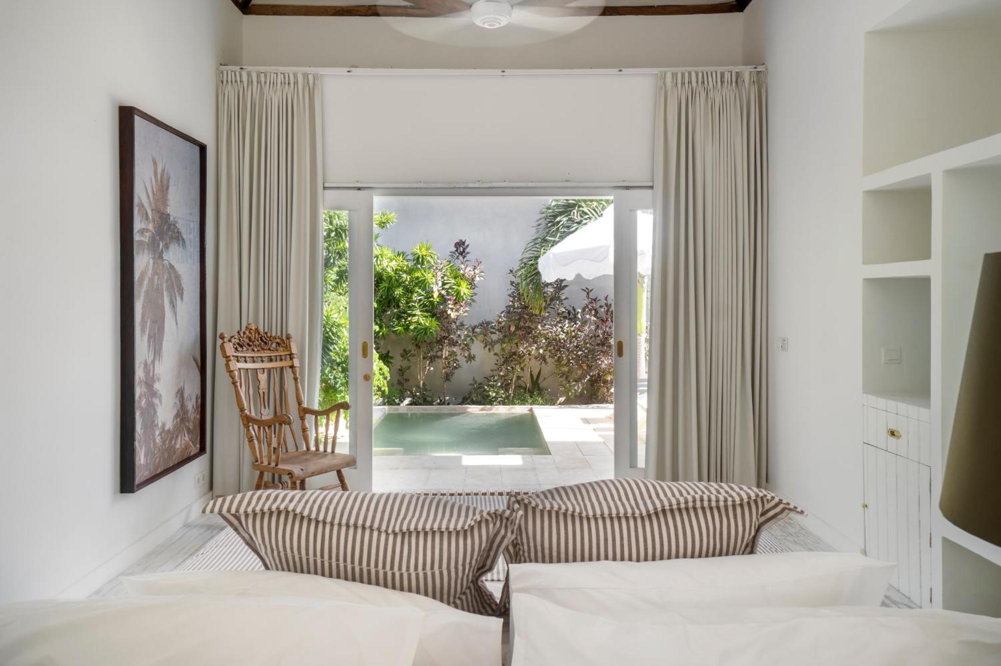 Ria Uluwatu, Tropical Chic Hotel Extérieur photo